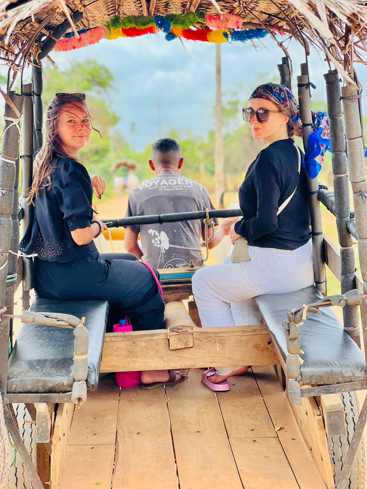 Guests enjoying a traditional village cart safari through rural countryside